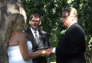 Rose and Brent with Rev. Eric Rose and Brent